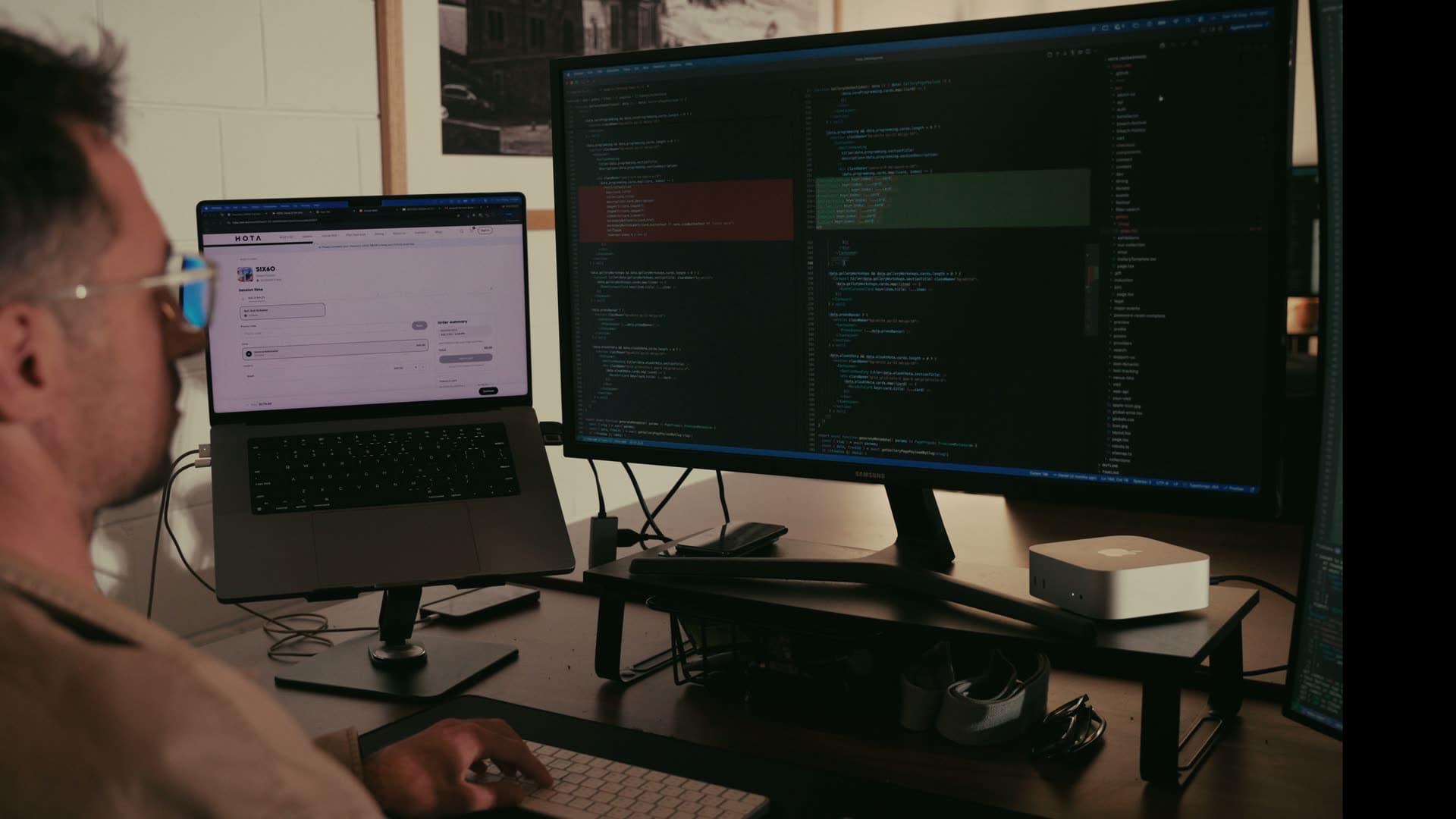 Kale, a Spritely developer, writing code at his desk